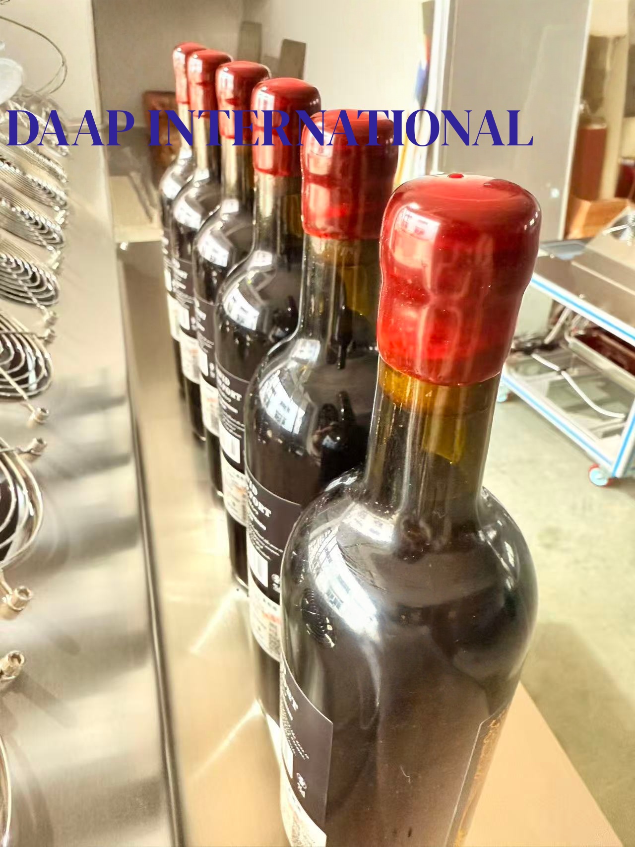 How Does Automatic Wax Dipping Improve Glass Bottle Sealing?