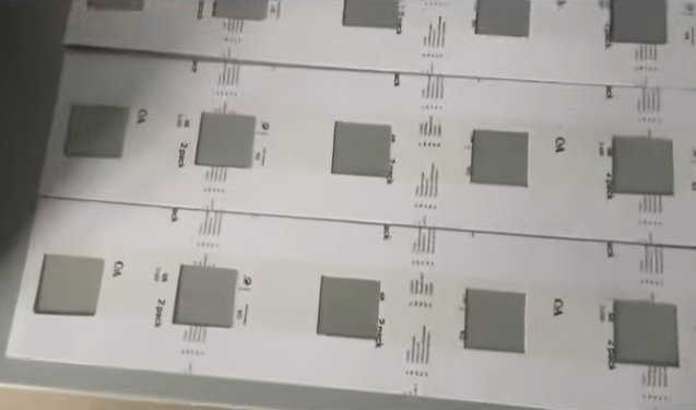 Applying 50mm Transparent Tape on Perforated Cardboard: The DMHA-520 Solution Applying 50mm Transparent Tape on Perforated Cardboard: The DMHA-520 Solution